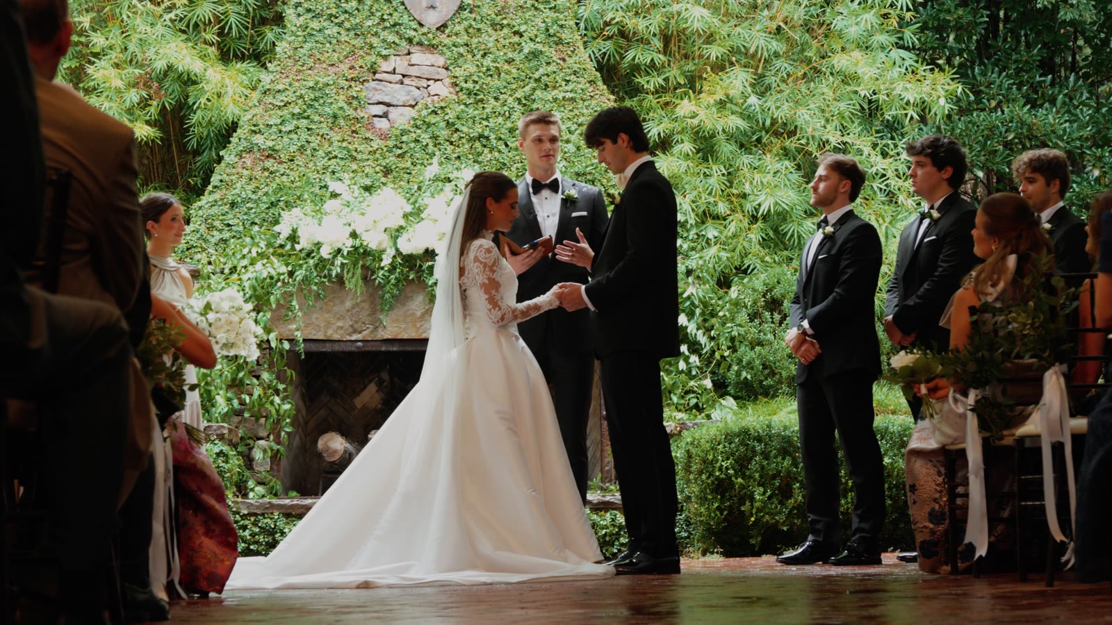 Garden wedding ceremony under ivy
