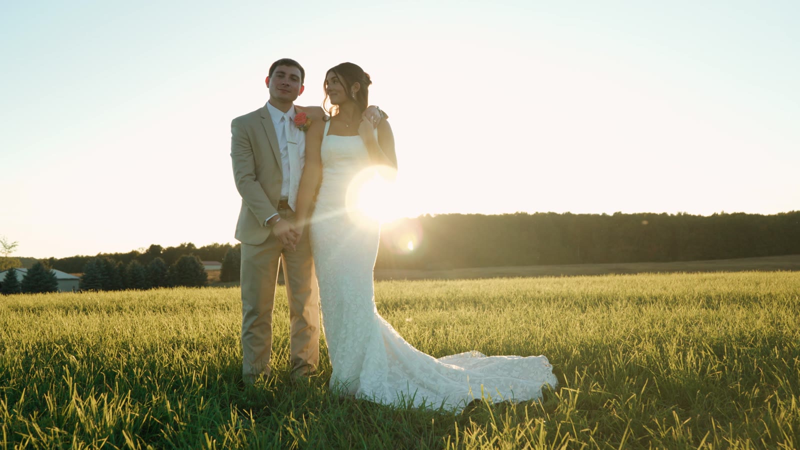 Couple in a field at golden hour